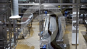 Beer factory interior with lot of machines