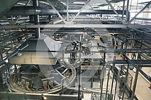Beer factory with many industrial machines, brewery production manufacturing