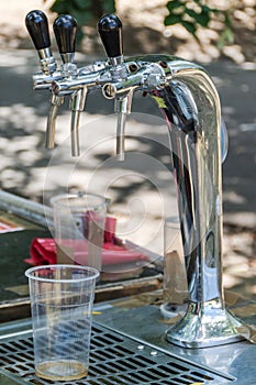 Refreshing Moments: Beer Taps and Empty Glasses at the Jazz Music Festival photo