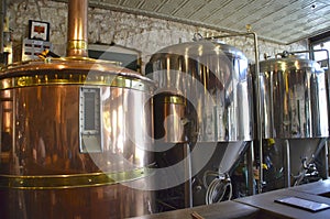 Beer fermentation and brewing tanks at a brewery