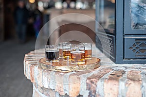 Beer flight on brick surface at local microbrewery