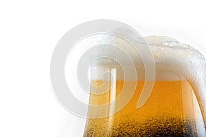 Beer with foam in glass isolated on white background.