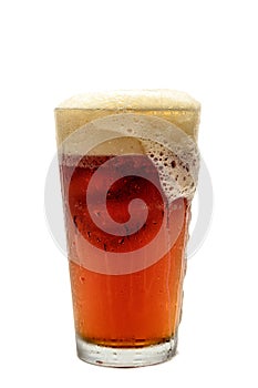 Beer Foaming over Glass photo