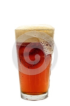 Beer Foaming over Glass