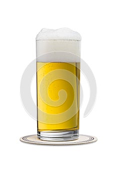 Beer glass with beermat on white