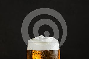 Beer glass on black background beer bar