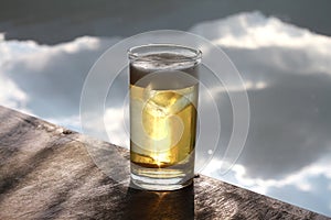 Beer in a glass isolated on wood table.