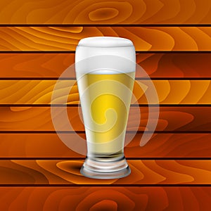 Beer glass on wood background