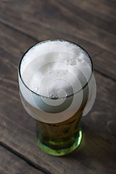 Beer glass on a wooden table