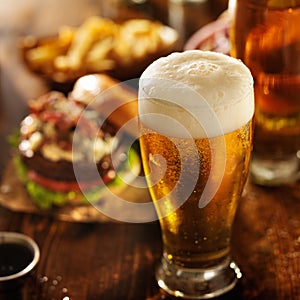 Beer with hamburgers on restaurant table