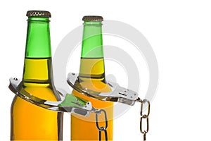 Beer and Handcuffs - Drunk Driving Concept