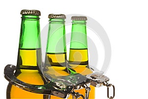 Beer and Handcuffs - Drunk Driving Concept