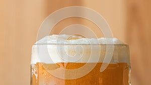 Beer head or collar, frothy foam on top of beverage photo