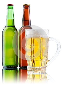 Beer mug and bottle on white background