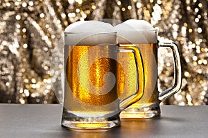 Beer mug in front of a glittering background