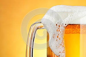 Beer mug with froth photo