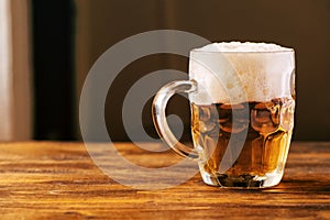 Beer mug full of cold fresh alcohol drink