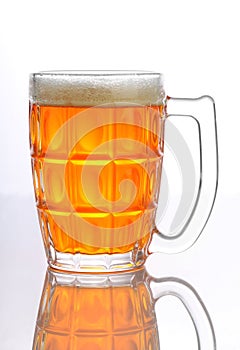 Beer Mug / Glass with froth on white background