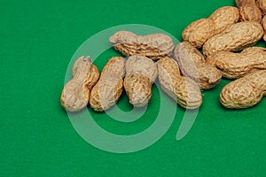 beer peanuts in shells bar alcohol green background