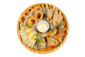 beer plate fried ribs onion rings french fries fish nuggets on a wooden plate on a white background1