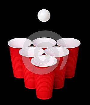 Beer pong. Red plastic cups and ping pong ball over black