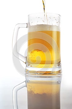 Beer pour in glass photo