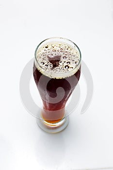 Beer is pouring from a bottle