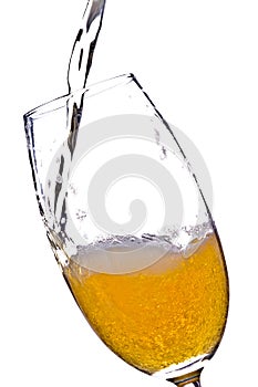 Beer pouring in glass