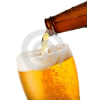 Beer is pouring into glass