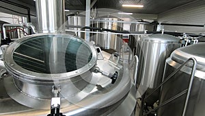 Beer production. Stainless steel containers for brewing beer. automated process