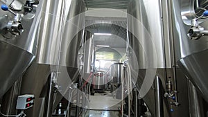 Beer production. Stainless steel containers for brewing beer. automated process