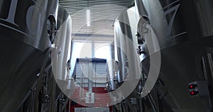 Beer production. Stainless steel containers for brewing beer. automated process