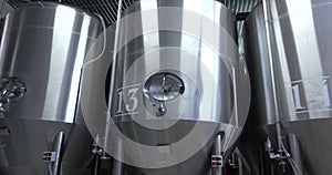 Beer production. Stainless steel containers for brewing beer. automated process