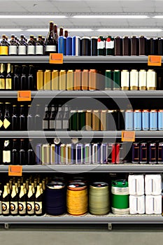 Beer on shelf in supermarket vertical photo mockup