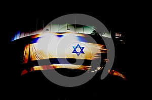 Beer-Sheva, ISRAEL - April 2012:Israeli flag in the black night sky in Israels Independence Day in Beer-Sheva, Israel