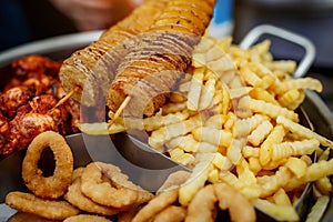 Beer snacks. French fries, chicken wings, grilled, potato chips