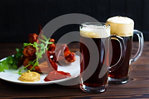 Beer snacks, pub, kitchen background, restaurant menu. Two mugs