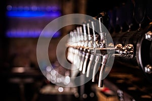 Beer tap array in the bar