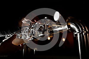 Beer tap in bar, mock up with selective focus. Hand of bartender pouring a beer in tap. Pouring beer for client.