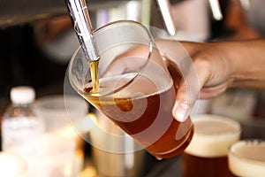 Beer tap pouring a draught beer