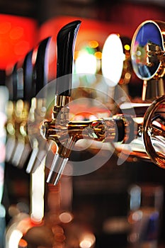 Beer taps inside pub
