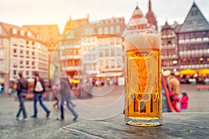 Beer Time in old town square romerberg at Frankfurt Germany