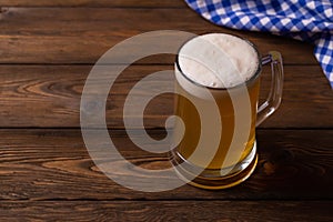 Beer On Wooden Board To Celebrate Oktoberfest