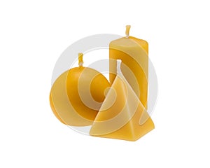 Beeswax candles isolated over white