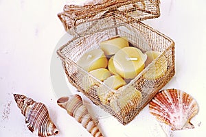 Beeswax candles and sea shells