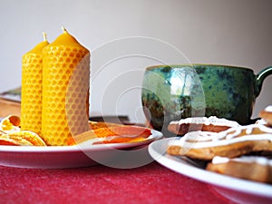 Beeswax candles and tea cup