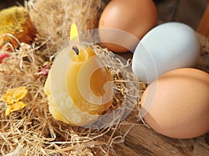 Beeswax Egg Handmade candle with chicken eggs. Crafting.