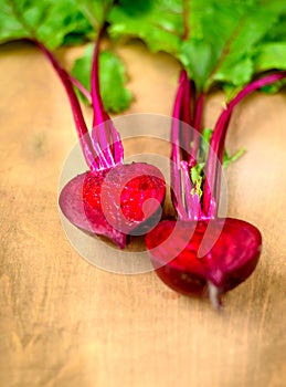 Beet, beetroot bunch on wooden background. Copy space.
