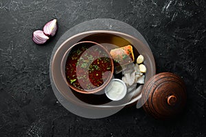 Beet borsch with lard and sour cream.