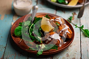 Beet falafel with tahina sauce and green salad